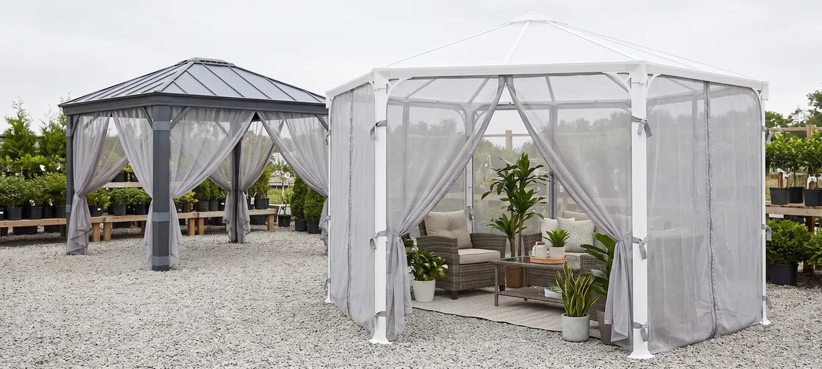 Garden gazebo fitted with fine mesh insect netting on display